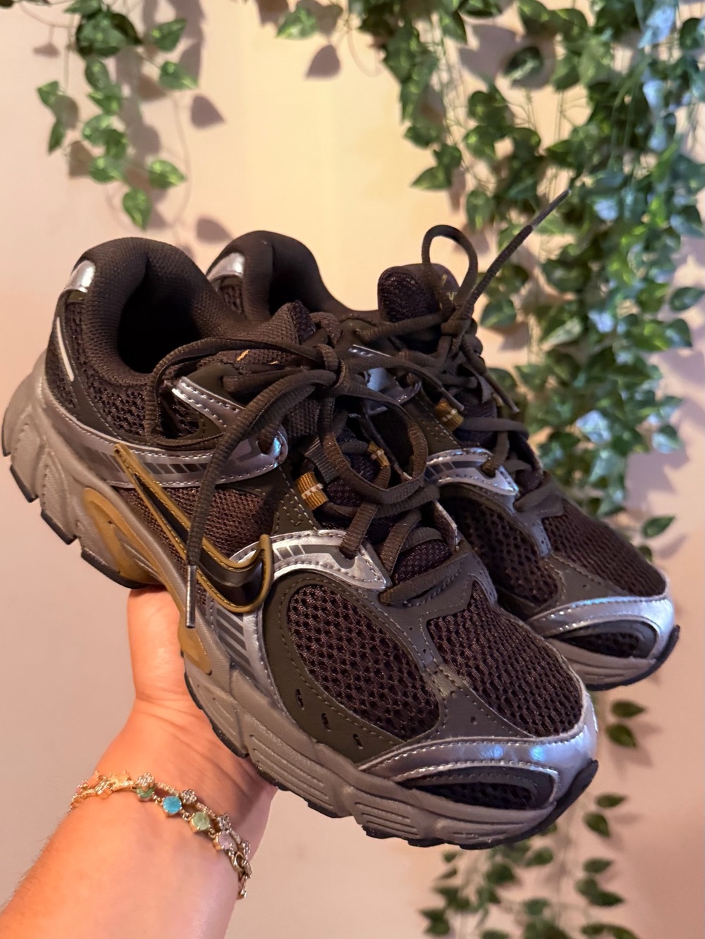 Nike Kids Black and Gray Sneakers with Gold Swoosh